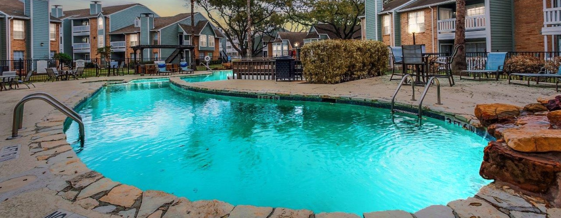 Schedule an apartment tour at Oaks at Greenview in Houston, Texas and explore resort-style amenities including the swimming pool and outdoor gathering spaces